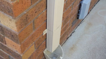 Down pipe leaf diverter